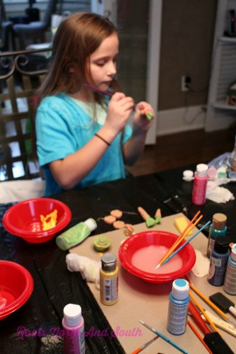 Budding artists painting for the miniature garden