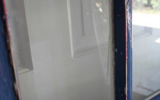 Sanding Off the Scars on an Old Door