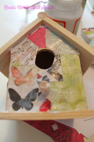 Layering on the Mod Podge on a Birdhouse