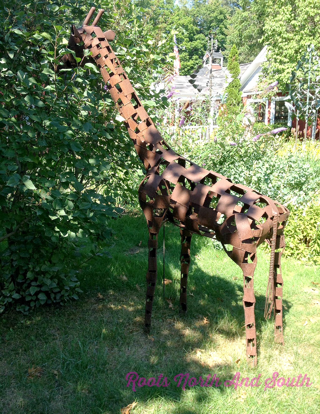 concrete giraffe statue